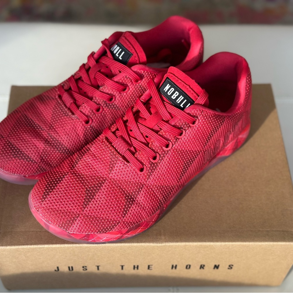 For sale is a pair of red Nobull Women's Prism Trainer Shoes in size 9.